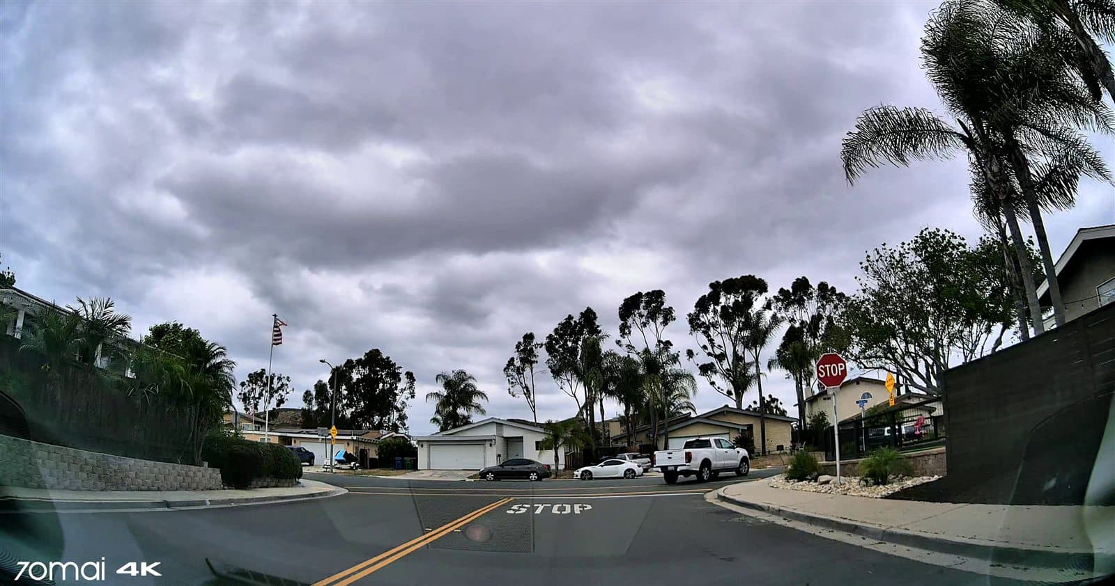 Dashcam frame from a pilot corridor with a detected stop sign